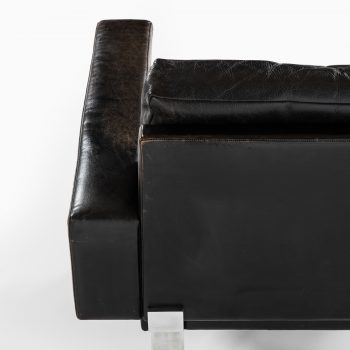 Illum Wikkelsø easy chair in steel and black leather at Studio Schalling