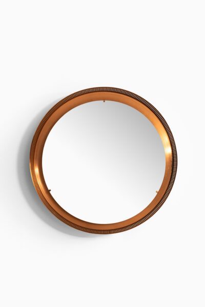 Round mirror in copper at Studio Schalling