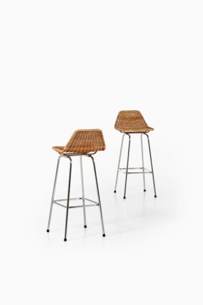 Bar stools in steel and rattan at Studio Schalling