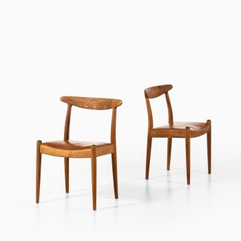 Hans Wegner W1 dining chairs in oak and leather at Studio Schalling