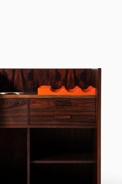 Expanding bar cabinet in rosewood at Studio Schalling