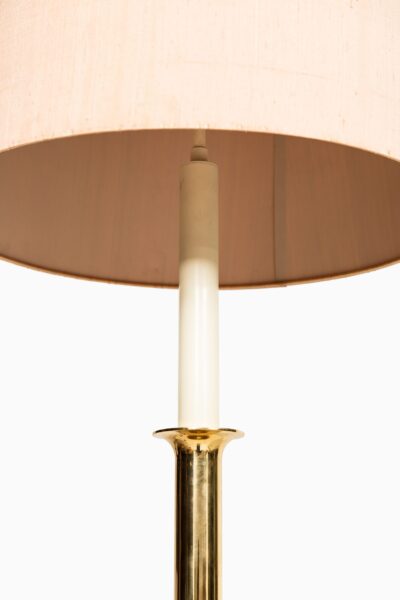 Pair of tall table lamps in brass at Studio Schalling