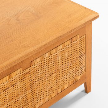 Kai Winding chest in oak and woven cane at Studio Schalling