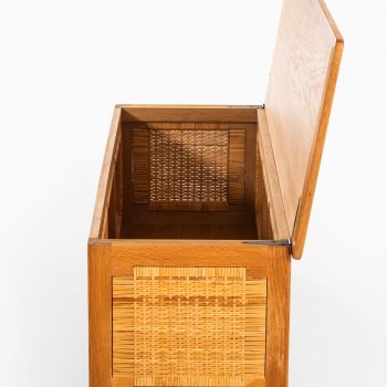 Kai Winding chest in oak and woven cane at Studio Schalling