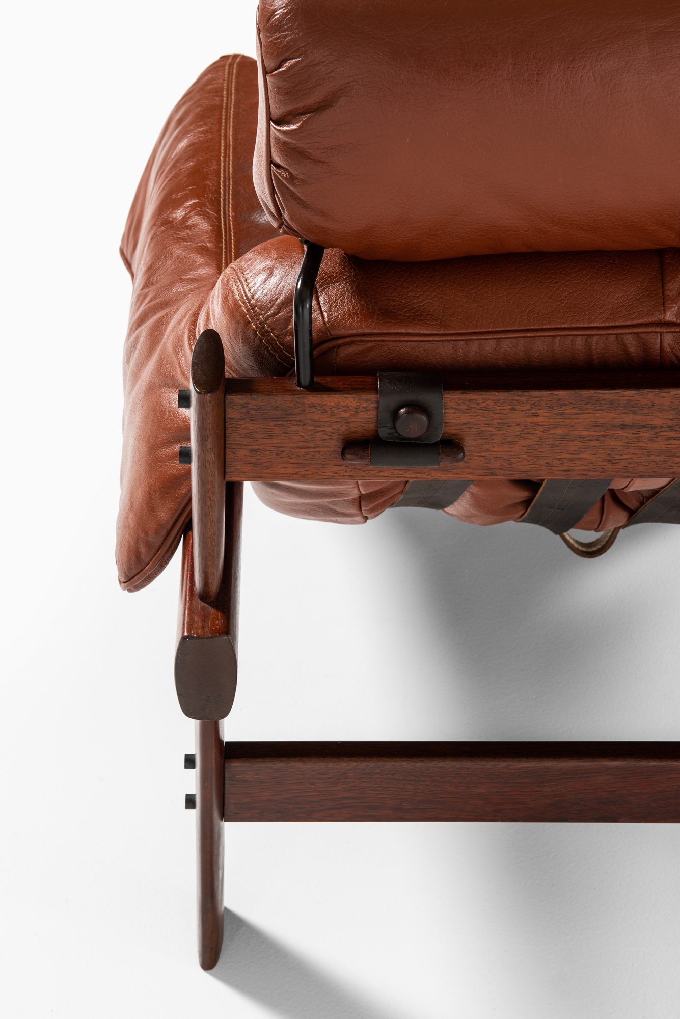 Percival Lafer easy chair in rosewood and brown leather at Studio Schalling