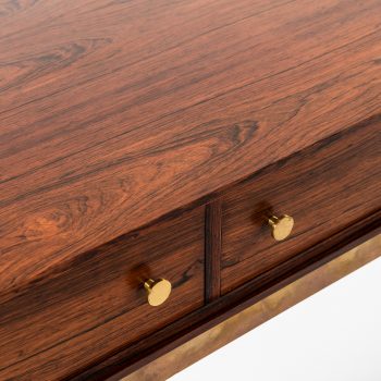 Poul Nørreklit side tables in rosewood and brass at Studio Schalling