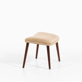 Illum Wikkelsø stool model 91 in rosewood and light fabric at Studio Schalling