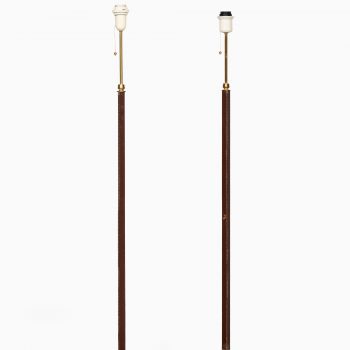 Floor lamps in brass and leather by Falkenbergs Belysning AB at Studio Schalling