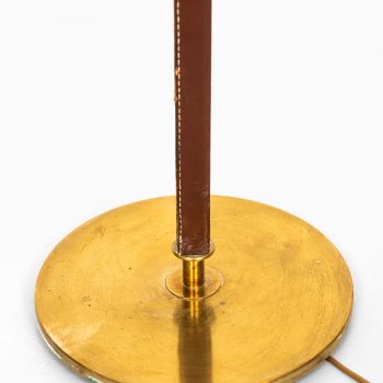 Floor lamps in brass and leather by Falkenbergs Belysning AB at Studio Schalling