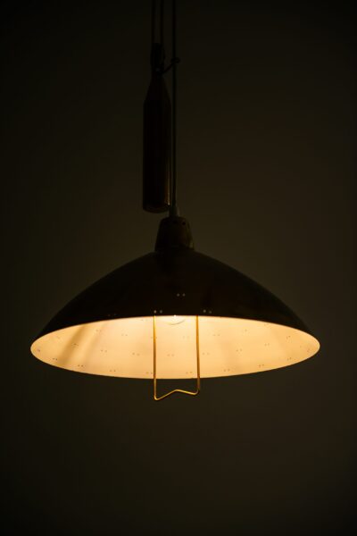 Itsu counter weight ceiling lamp in the style of Paavo Tynell at Studio Schalling