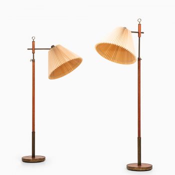 Floor lamps in leather and brass by unknown designer at Studio Schalling
