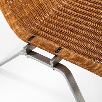 Poul Kjærholm PK-22 easy chairs in steel and rattan at Studio Schalling