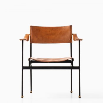 Armchair in black lacquered steel and leather at Studio Schalling