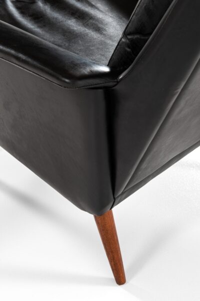 Pair of easy chairs in teak and black leather at Studio Schalling