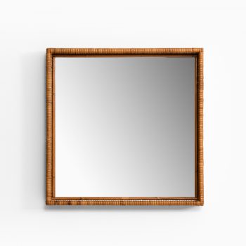 Mirror in woven cane at Studio Schalling