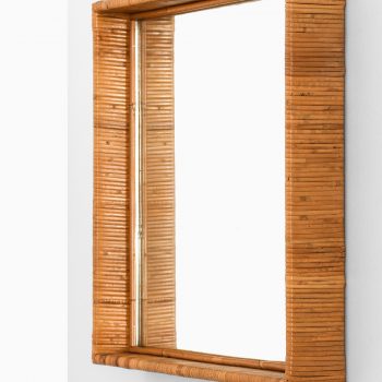 Mirror in woven cane at Studio Schalling