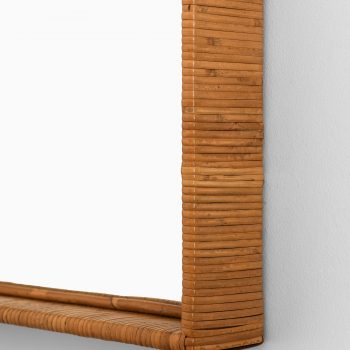 Mirror in woven cane at Studio Schalling
