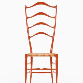Side chair in red lacquered wood and cane at Studio Schalling