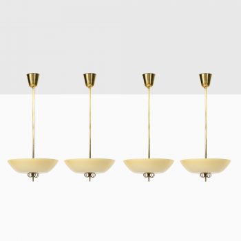 Paavo Tynell ceiling lamps in brass and glass at Studio Schalling