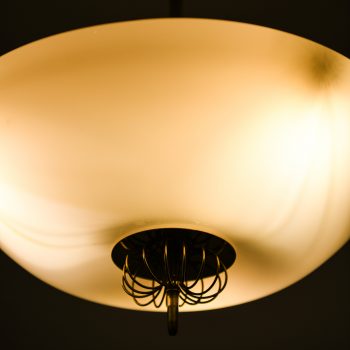 Paavo Tynell ceiling lamps in brass and glass at Studio Schalling