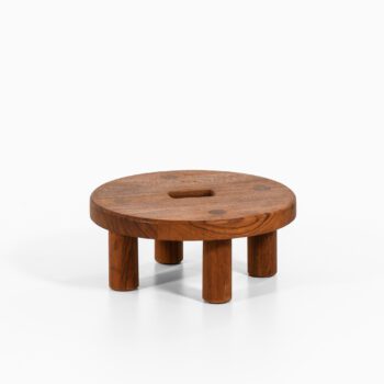 Low stool in teak at Studio Schalling