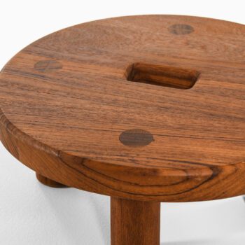 Low stool in teak at Studio Schalling