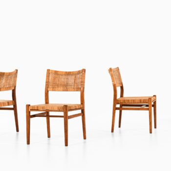 Dining chairs in oak and cane by unknown designer at Studio Schalling