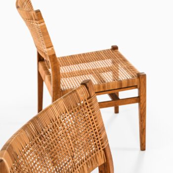 Dining chairs in oak and cane by unknown designer at Studio Schalling