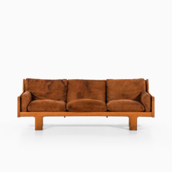 Sofa in oak, cane and leather at Studio Schalling