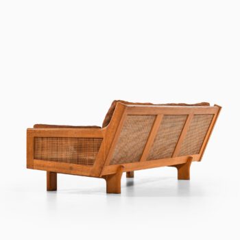 Sofa in oak, cane and leather at Studio Schalling