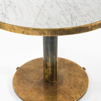 Dining table in brass and Carrara marble top at Studio Schalling