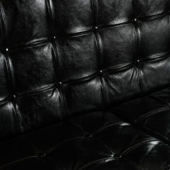 Karl-Erik Ekselius sofa in teak and black leather at Studio Schalling