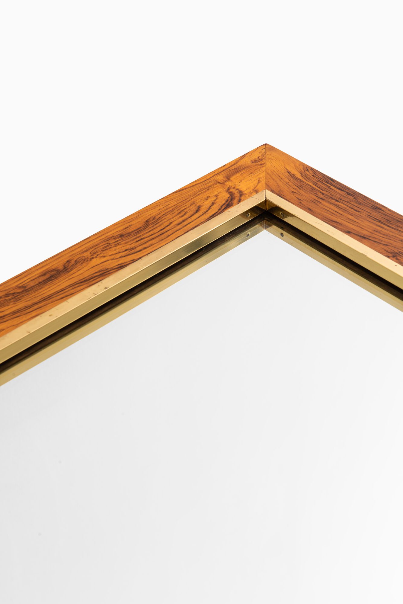 Rosewood mirror with brass by Fröseke at Studio Schalling