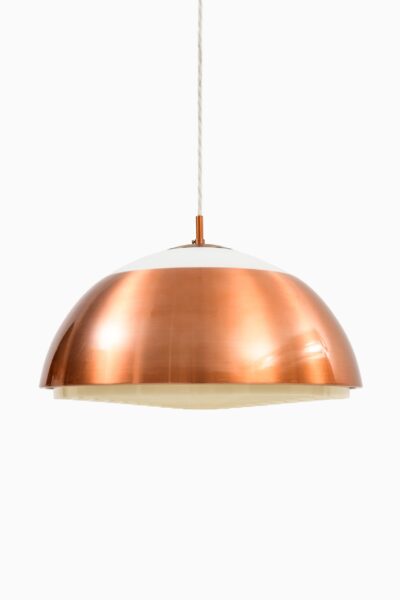 Ceiling lamps in copper and opaline glass at Studio Schalling