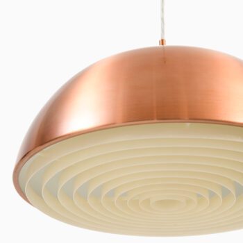 Ceiling lamps in copper and opaline glass at Studio Schalling