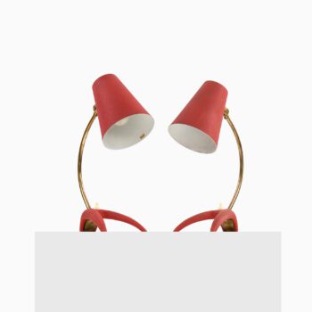 Table lamps in red lacquered metal at Studio Schalling