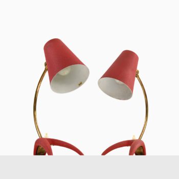 Table lamps in red lacquered metal at Studio Schalling