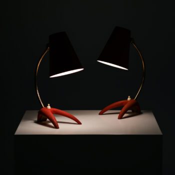 Table lamps in red lacquered metal at Studio Schalling