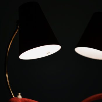 Table lamps in red lacquered metal at Studio Schalling