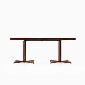 Dining table in bronze and mahogany at Studio Schalling