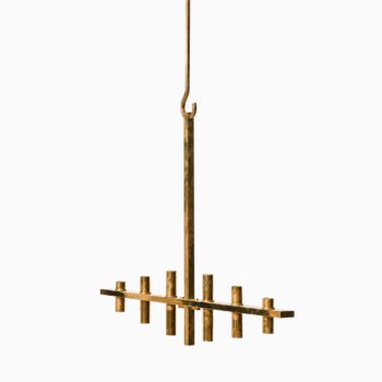 Large hanging chandelier in brass at Studio Schalling