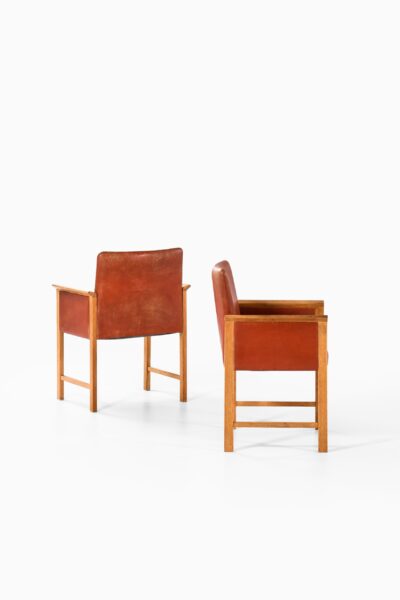 Armchairs in oak and red leather at Studio Schalling