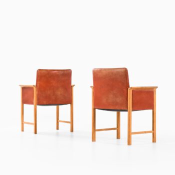 Armchairs in oak and red leather at Studio Schalling