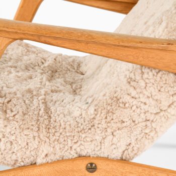 Easy chair with stool in sheepskin at Studio Schalling