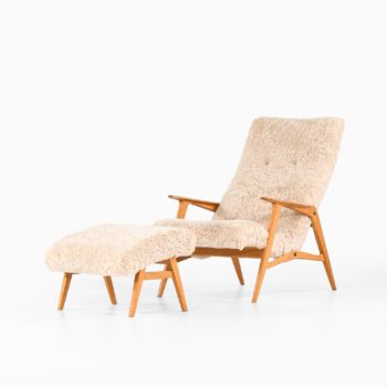 Easy chair with stool in sheepskin at Studio Schalling