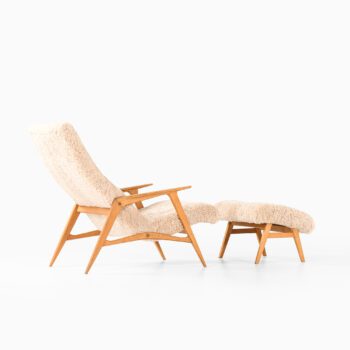 Easy chair with stool in sheepskin at Studio Schalling