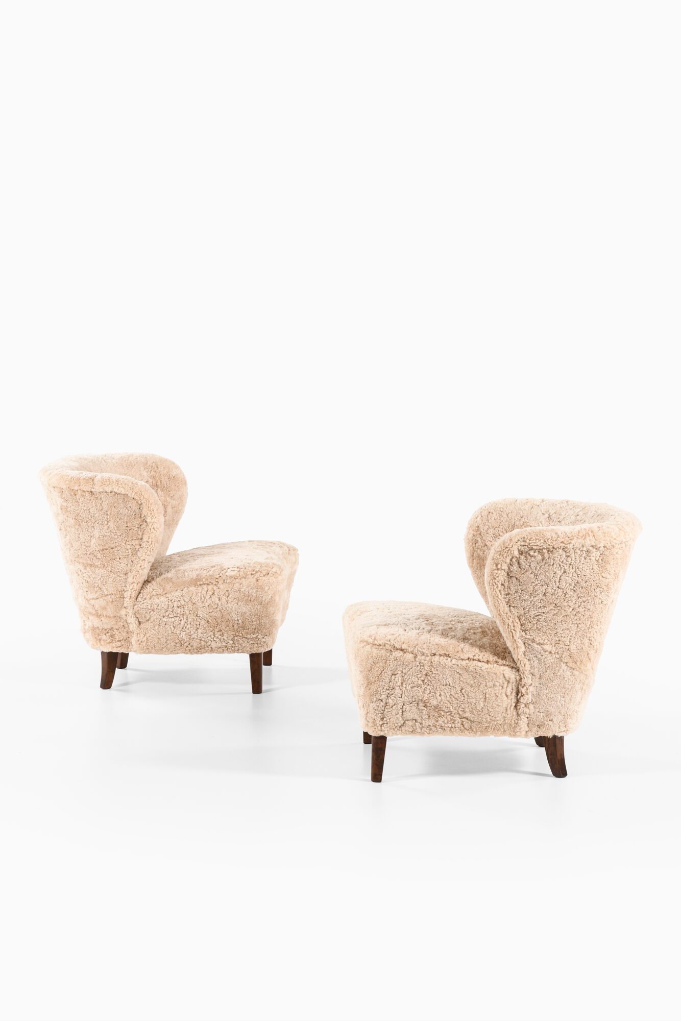 Gösta Jonsson easy chairs in sheepskin at Studio Schalling