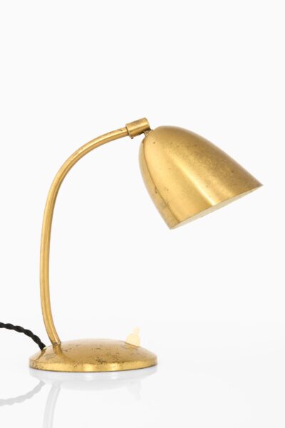 Table lamp in brass by YBE konst at Studio Schalling