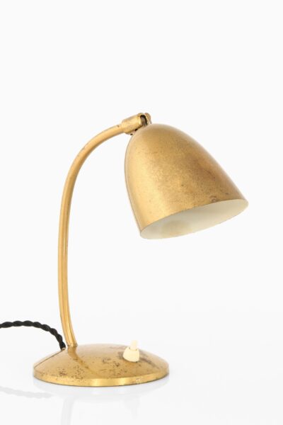 Table lamp in brass by YBE konst at Studio Schalling