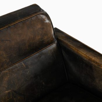 Sofa in black painated leather at Studio Schalling